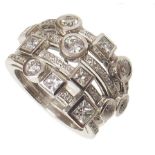 Diamond 4-row platinum rain dance ring , a mixture of round brilliant and square princess cut