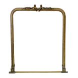 Late 19th century over mantel mirror, arched gesso frame with floral pediment containing original