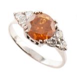 Fancy deep yellow-orange diamond solitaire ring , central diamond of treated colour weighing approx.