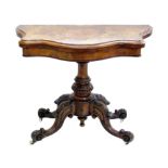 Victorian figured walnut fold-over card table, the top with matched veneers, serpentine shape, green