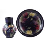 Moorcroft small dish and a vase decorated with orchid and wisteria patterns (2) the dish measures