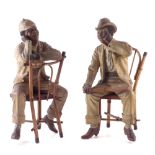 Pair of Johann Maresch painted terracotta figures, modelled seated on real bamboo chairs, one