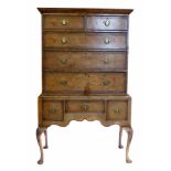 Late 19th century Queen Anne design walnut chest on stand, top section with two short and three long