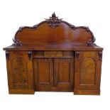 Victorian mahogany inverted breakfront sideboard, arched backboard decorated with moulded and carved