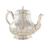 Victorian silver teapot marks by Martin Hall & Co , squat baluster form on circular spreading