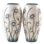 Pair of Moorcroft Moon Daisy pattern vases (2) 18cm high For a condition report please visit our