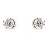 Diamond solitaire 18ct white gold studs , the two round brilliant cut diamonds with a combine