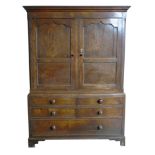 George III oak press cupboard, moulded cornice above a pair of two panelled doors, quartered