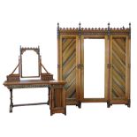 Gothic Revival inlaid mahogany three piece bedroom suite comprising, dressing table, bedside