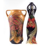 Two Moorcroft vases decorated with stylised flora, both seconds (2) the tallest stands 31cm high For