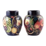 Two Moorcroft Queens Choice ginger jars designed by Emma Bossons, both marked as seconds 20cm high