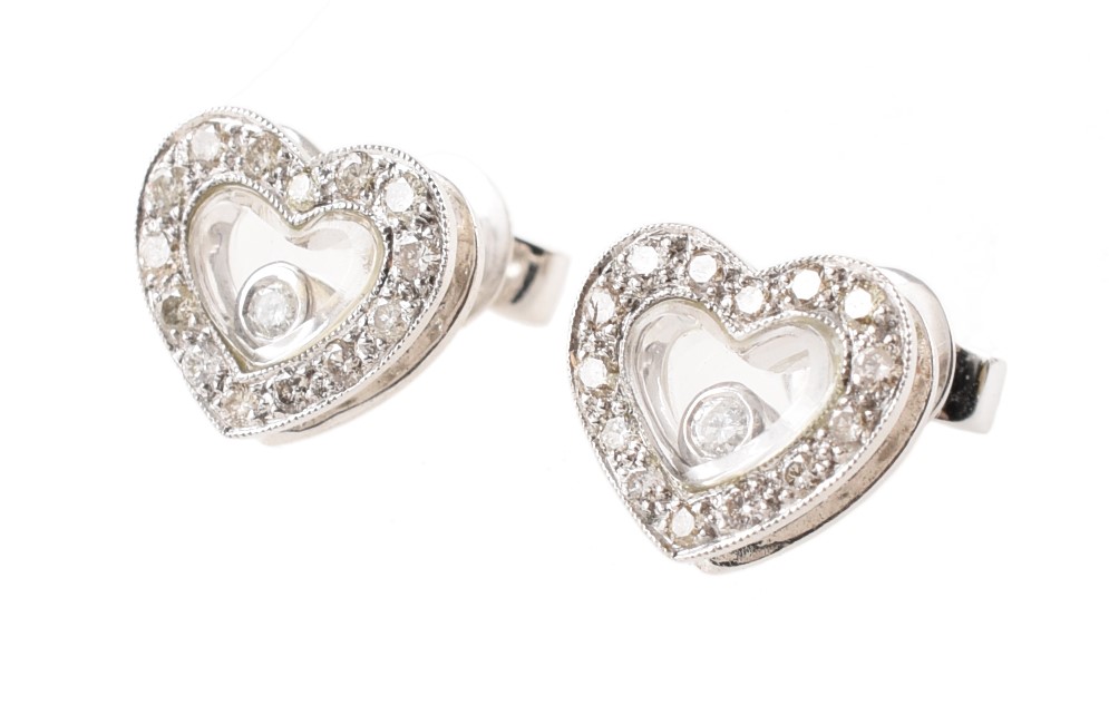 Pair of 14ct white gold heart shaped 'floating' diamond earrings , heart shaped earrings