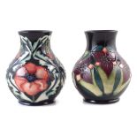 Moorcroft poppy vase, designed by Rachel Bishop, together with one other similar shaped vase, both