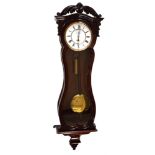 A 19th century rosewood single weight Vienna regulator with serpentine case. The rounded arch