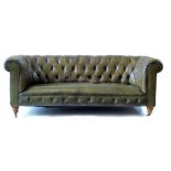 Victorian deep-buttoned Chesterfield with green leather covers, horsehair sprung seat, turned