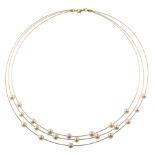 Mikura 3-row cultured pearl yellow gold necklace , cultured pearls measuring approx. 6mm diameter,