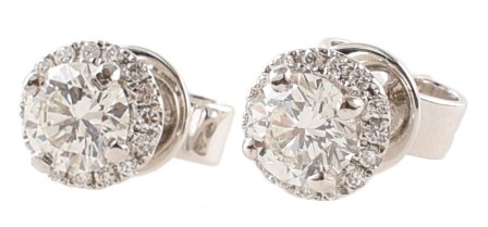 Pair of diamond solitaire 18ct white gold earrings, two round brilliant cut diamonds weighing