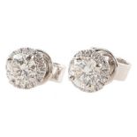 Pair of diamond solitaire 18ct white gold earrings, two round brilliant cut diamonds weighing