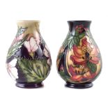 Two small Moorcroft vases, one decorated with mallow pattern but marked as a second (2) 13.5cm