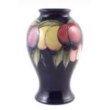 Moorcroft wisteria vase , 23cm high For a condition report please visit our website www.