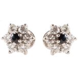 Pair of sapphire and diamond flower head cluster earrings , round mixed cut central sapphires