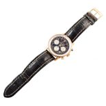 Breitling Navitimer 18ct rose gold chronograph wristwatch on black leather Breitling strap, round