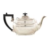 Three-piece silver tea set comprising teapot, milk jug and sugar bowl , rounded rectangular forms