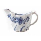 Lowestoft low Chelsea Ewer circa 1775, painted with flora in under glaze blue, 9.5cm long For a