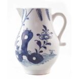 Lowestoft sparrow beak cream jug circa 1775 , painted with a rock, fence and Chrysanthemum, 8.5cm