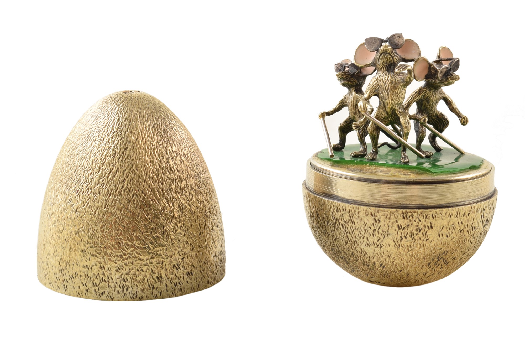 Stuart Devlin Surprise silver-gilt egg, hollow textured gilt egg measuring approx. 7cm high, stamped