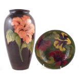 Moorcroft hibiscus pattern vase, together with a similar bowl (2) the vase stands 31cm high For a