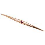 Ruby & seed pearl set rose gold bar brooch , assessed as a minimum of 15ct gold, 7cm long, pierced
