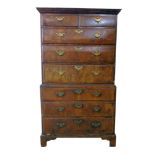 Late 18th century walnut chest on chest, cornice cut on cross-section timber, all drawers with