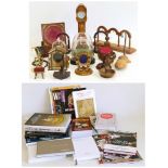 Twenty one assorted pocket watch stands including glass domed examples and wooden examples, also a