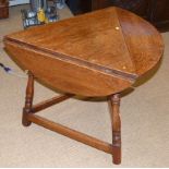 Early 20th century oak cricket style table with three drop leaves 76cm diameter Condition reports