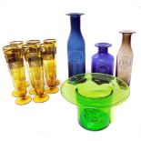 Four Dartington glass vases and eight Cardigan flutes Condition reports are not available for our