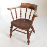 A 19th century Windsor captain's chair,