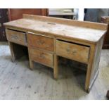 A pine dresser, fitted with three drawers over one drawer, raised on square legs,