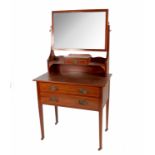 An Edwardian mahogany dressing table, with rectangular mirror over a single drawer,