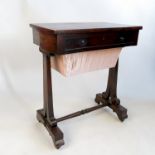 A 19th century rosewood rectangular shaped work table, with frieze drawer over wool compartment,