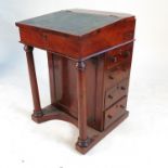 A 19th century mahogany Davenport, with lift up stationery compartment,