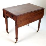 A 19th century mahogany Pembroke table, fitted with frieze drawer and raised on turned legs,