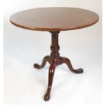 A 19th century mahogany circular occasional table, with bird cage action and tripod support,