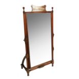 A short cheval mirror, with cut brass inlay, raised on turned supports, mirror width 19.