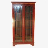A Georgian design free standing mahogany bookcase,