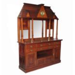 A late 19th Century mahogany sideboard, with an architectural roof canopy with three dormers,