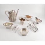 A quantity of silver plated items, to include trays, a coffee pot, toast racks, jugs, sugar bowl,