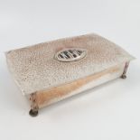 An Cambray Ware Arts and Crafts silver plated cigar box, of shaped rectangular form,