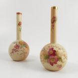 Two Royal Worcester blush ivory vase, with tall slender necks and bulbous body,