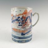 An 18th century Imari tankard, af, height 6.